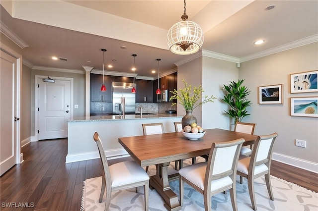 dining area featuring dark wood finished floors, recessed lighting, baseboards, and ornamental molding