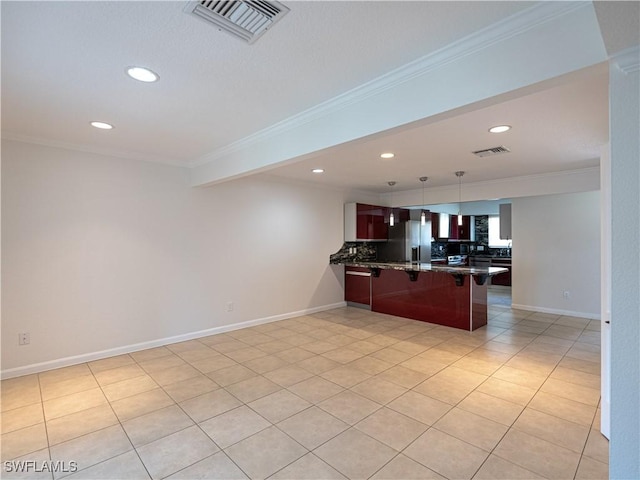 kitchen with kitchen peninsula, ornamental molding, pendant lighting, stainless steel fridge with ice dispenser, and a breakfast bar area