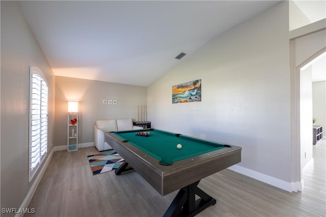 rec room with wood-type flooring, vaulted ceiling, and pool table