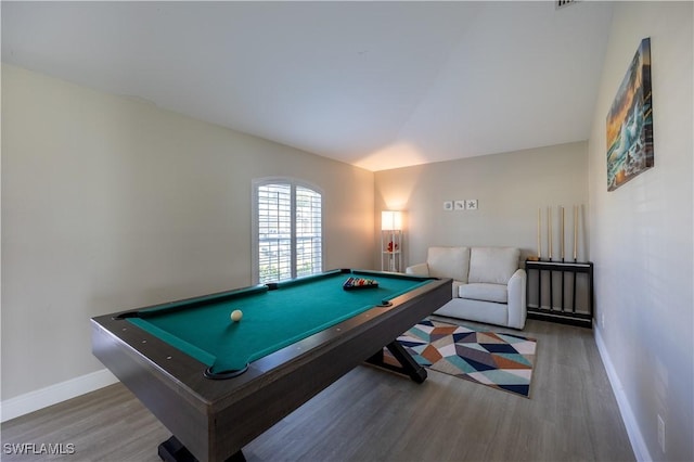 recreation room featuring hardwood / wood-style flooring, lofted ceiling, and billiards