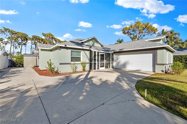 4560 Key Largo Ln, Bonita Springs, FL 34134 - view of front of property with driveway, an attached garage, stucco siding, and roof with shingles