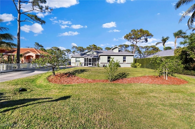 4560 Key Largo Ln, Bonita Springs, FL 34134 - single story home featuring asphalt driveway and stucco siding