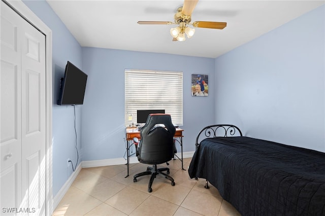 4560 Key Largo Ln, Bonita Springs, FL 34134 - bedroom with light tile patterned flooring, baseboards, and ceiling fan