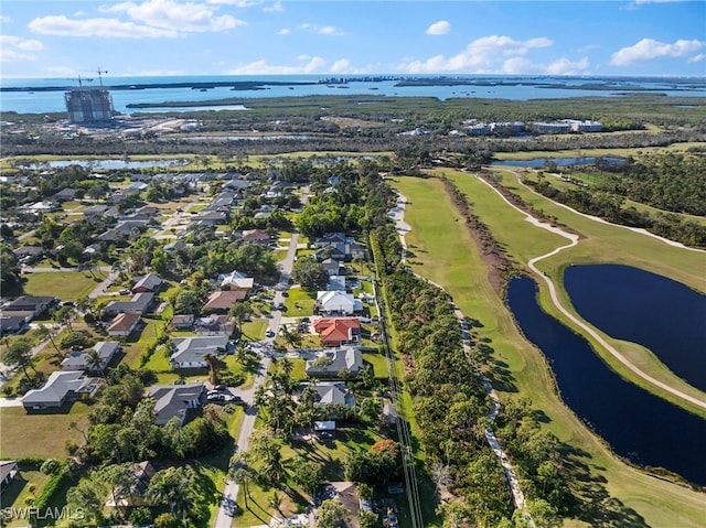 4560 Key Largo Ln, Bonita Springs, FL 34134 - aerial view of property's location with nearby suburban area, a golf club, and a nearby body of water