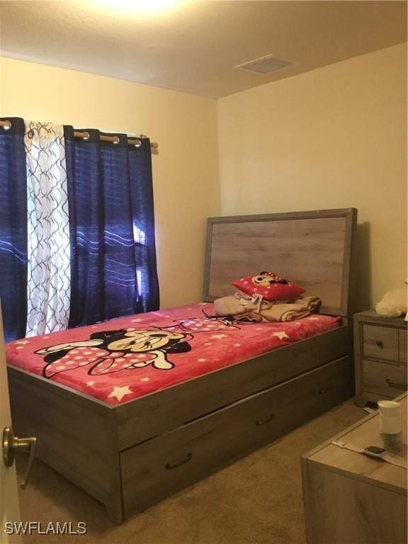 bedroom featuring carpet flooring