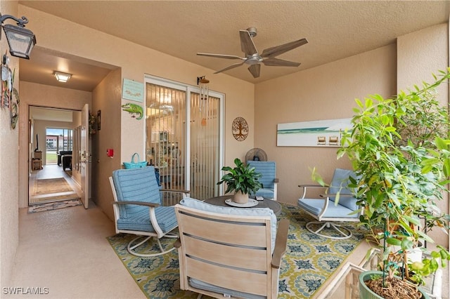 view of patio with ceiling fan