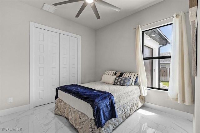 bedroom with a closet and ceiling fan