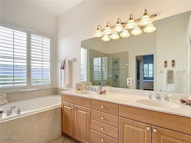 bathroom with plus walk in shower and vanity