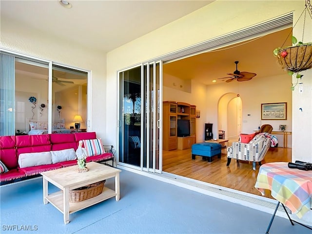 living room featuring ceiling fan