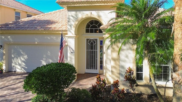 property entrance featuring a garage