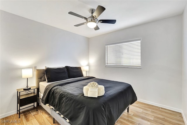 bedroom featuring ceiling fan and light hardwood / wood-style floors