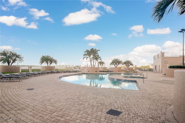 view of pool featuring a patio area