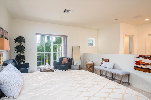 bedroom featuring carpet floors and access to outside