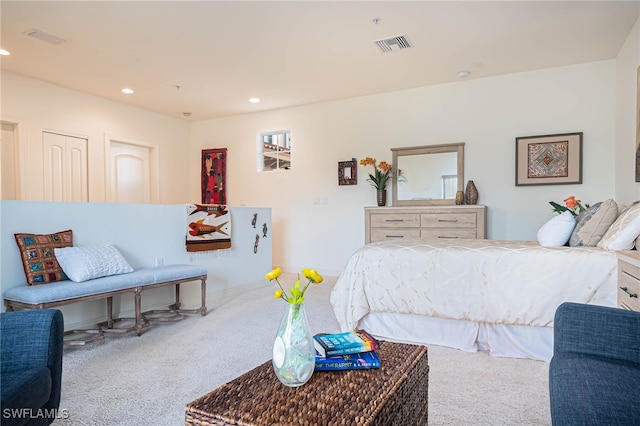 bedroom featuring carpet flooring and a closet