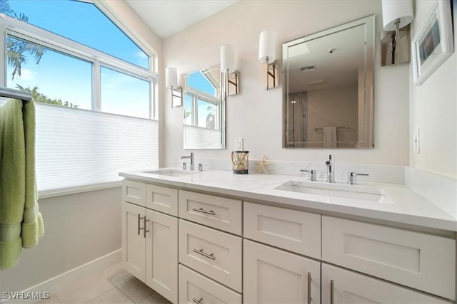 bathroom with vanity and tile patterned floors