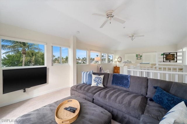 living room with ceiling fan and carpet floors