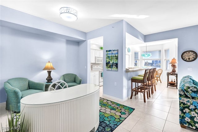 dining space with light tile patterned floors