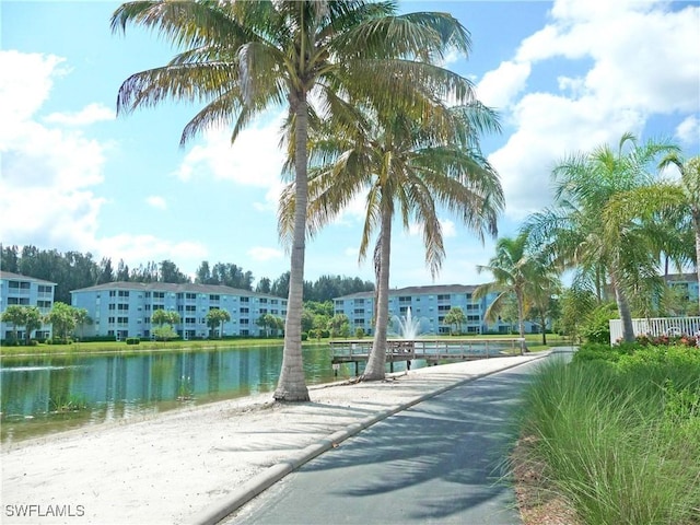 view of home's community with a water view