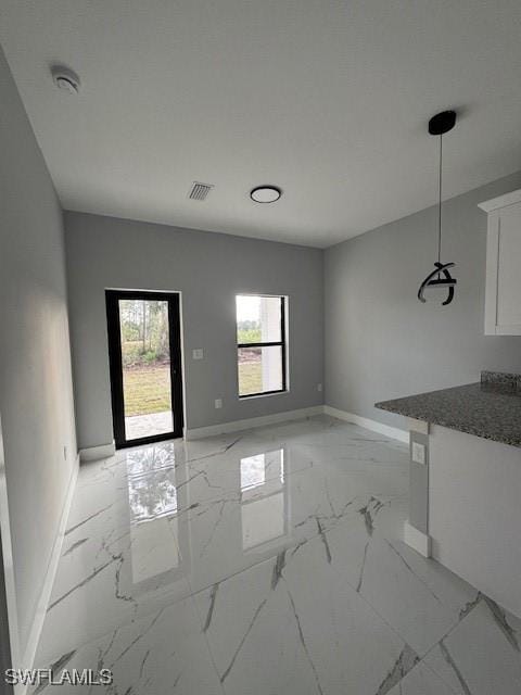 view of unfurnished dining area