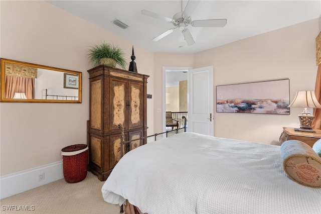 bedroom featuring ceiling fan and carpet floors