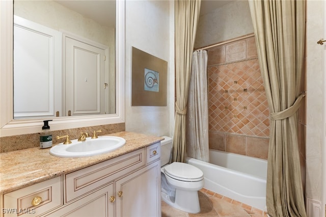 full bathroom with toilet, tile patterned floors, vanity, and shower / tub combo with curtain