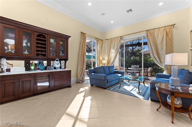 living room with crown molding and light tile patterned floors