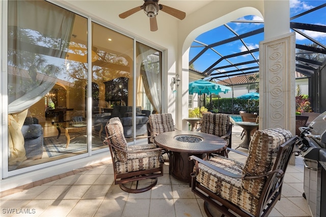 sunroom / solarium with ceiling fan