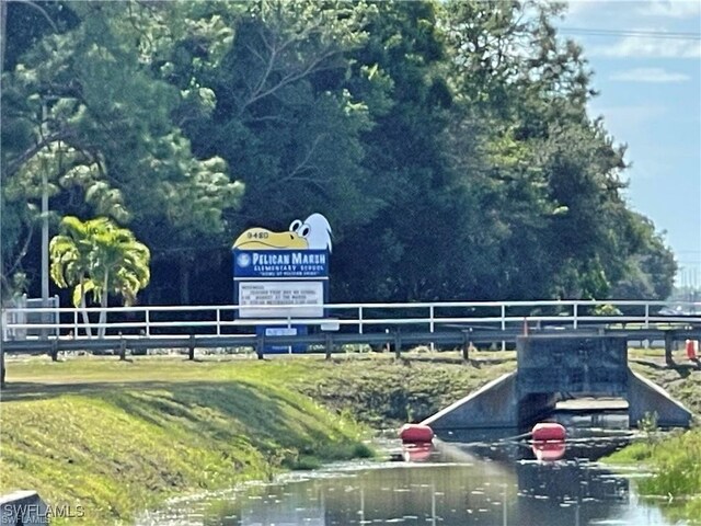 view of community with a water view