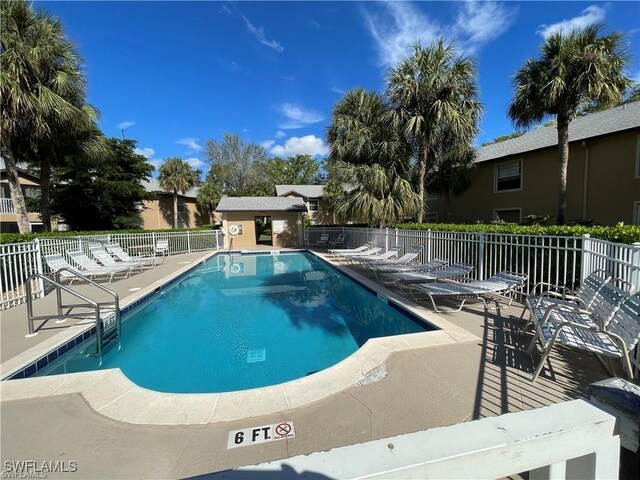 view of swimming pool featuring a patio area