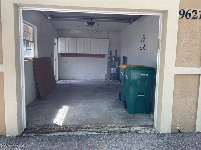 garage featuring electric water heater