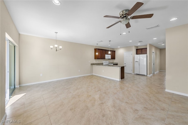 unfurnished living room featuring ceiling fan with notable chandelier