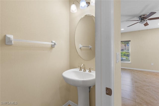 bathroom with tile patterned flooring and ceiling fan