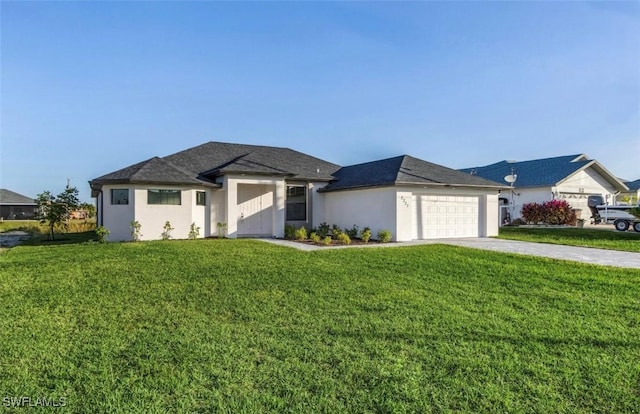 view of front facade with a front yard and a garage