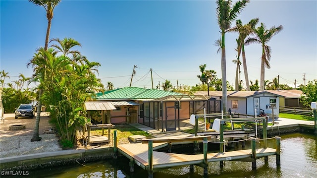 dock area with a water view