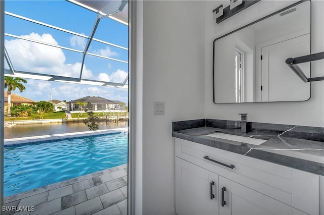 bathroom featuring vanity and a water view