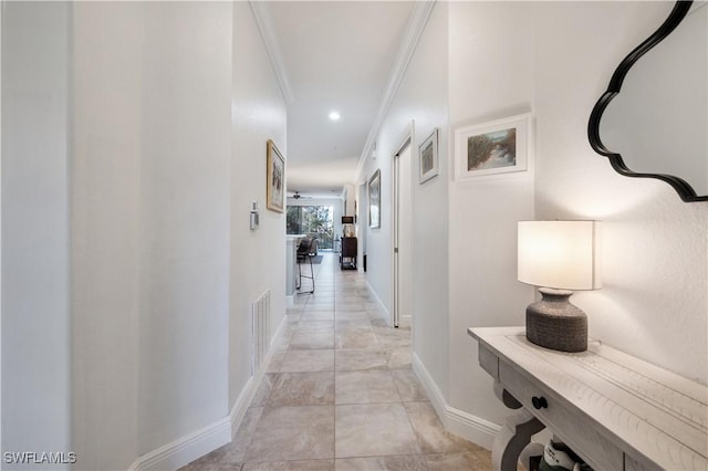 corridor featuring ornamental molding