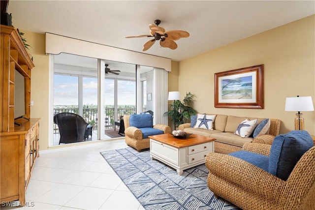 living room featuring light tile patterned floors and ceiling fan