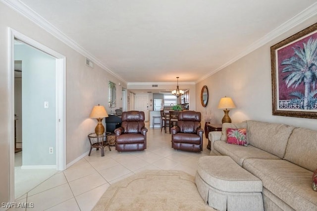 living room featuring a notable chandelier, light tile patterned floors, and crown molding