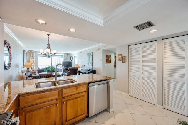 kitchen with sink, an inviting chandelier, dishwasher, and light stone countertops