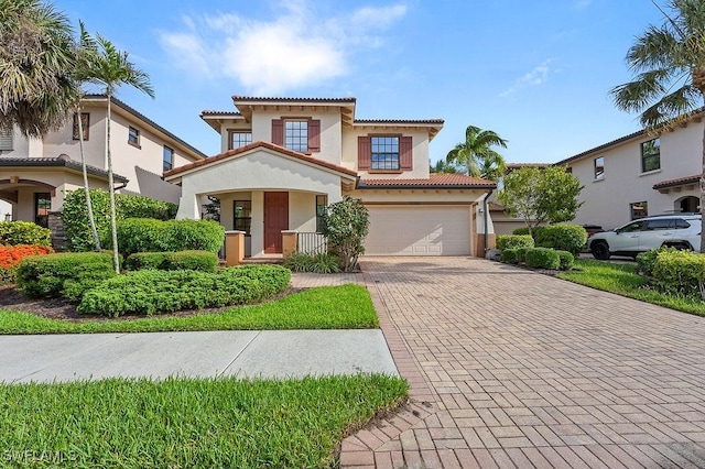 1248 Manado Dr, Naples, FL 34113 - mediterranean / spanish house featuring a garage