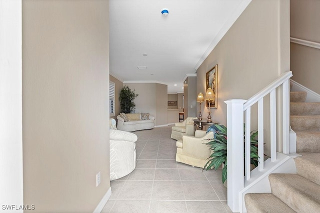 interior space featuring light tile patterned flooring and ornamental molding