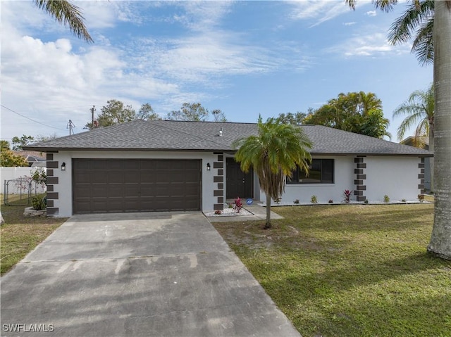 ranch-style house featuring a garage and a front yard