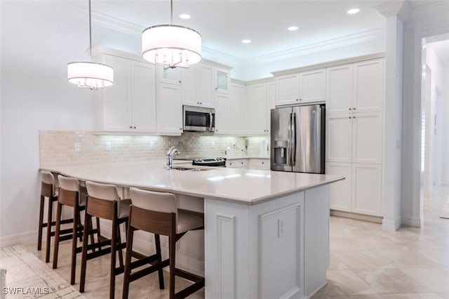 kitchen featuring pendant lighting, a kitchen breakfast bar, tasteful backsplash, kitchen peninsula, and stainless steel appliances