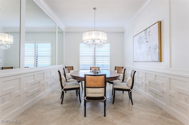 dining room with crown molding, plenty of natural light, and a chandelier