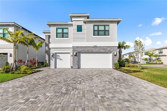 view of front of home with a garage