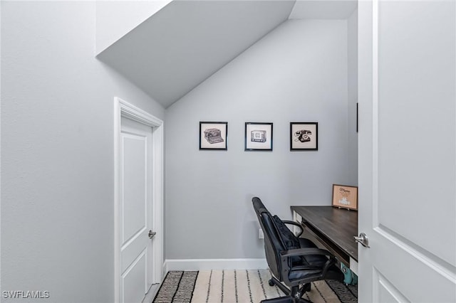 office space with lofted ceiling