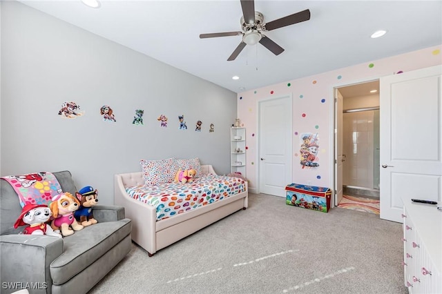 carpeted bedroom with ceiling fan