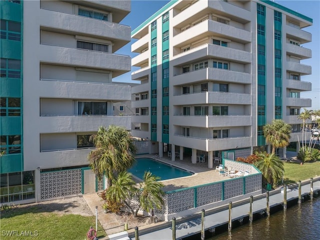 view of property with a water view