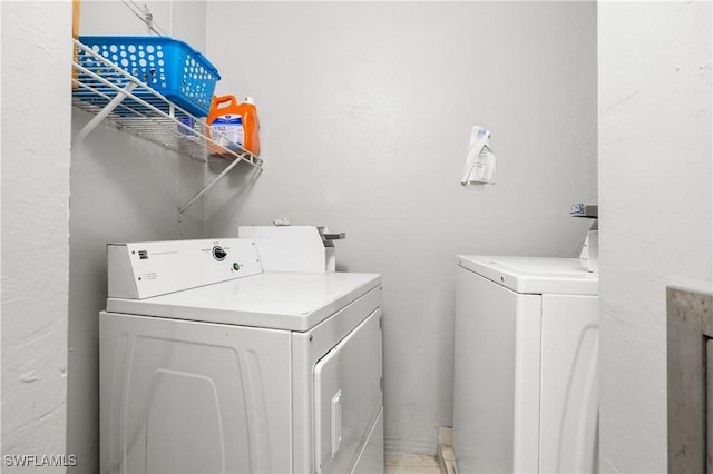 laundry room featuring washer and dryer