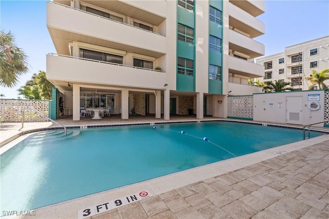 view of pool with a patio area